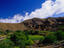 View of a village in the verdant landscape of the High Atlas mountains which run down the central spine of Morocco.