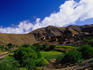 View of a village in the verdant landscape of the High Atlas mountains which run down the central spine of Morocco.
