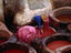 man works at tannery wells, Fes