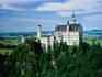 The Neuschwanstein Castle, nestled amongst trees 200 metres above the valley below.