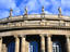 Statues crown the roof of the Stuttgart State Opera building.
