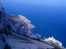 Looking down sheer cliffs to Catalan Bay on the Mediterranean side of Gibraltar, from the top cable-car station.