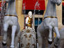 A statue of Caesar on his chariot being pulled by white chargers outside the gambling empire Caesar's Casino.