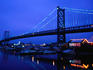 The Franklin Bridge (1926) and boat marina at night. The bridge crosses the Delaware River joining Philadelphia to New Jersey.