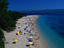 Holiday-makers soaking up the sun on the famous Zlatni Rat pebbled beach.