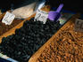 Close up of almonds and dried prunes in the market, Split.