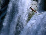Man leaping off one of the Skradinski Buk waterfalls.
