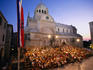 Audience beside the Cathedral of St Jacob watching a performance during the International Children's Festival.