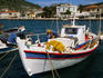 Fishing boats moored in the Ithaki town, or Vathy harbour, Ithaki island.