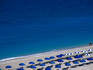 Lefkada's most popular beach, kathisma, prepared and ready for a day of relaxation.