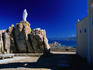 Statue of Virgin Mary at chapel of Notre Dame de la Serra, overlooking bay of Calvi.