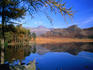 The view across Blea Tarn to the Langdale Pikes.
