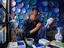 An enamelled copperware artist at work in Esfahan.
