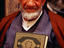 An edlerly mullah holds his Holy Koran (Qaran).