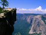 Hikers on Taft Point above Yosemite National Park and El Capitan