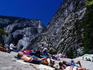 People rest on the flat rock on top of Vernal Falls, Yosemite.