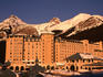 Facade and entrance of the Chateau Lake Louise basking in the afternoon sun, Banff National Park.