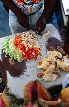 Conch salad, made from conch, pepper, onion, tomato, chilli and citrus juice, is the most popular of the Bahamian dishes and is readily available from the many open-air conch stands.