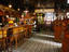 Interior of the Crown Liquor Saloon bar area which features ornate glass, tile and wooden decoration and furnishings, Belfast.