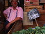 Artichoke seller at central fruit and vegetable market.