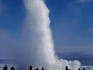 Spectators watching eruption of Stokkur geyser.