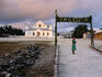 Vaitupu Island, May 2000. Talofa (hello or welcome) sign for the Constitutional Review Committee's (CRC) visit. Vaitupu's church is in the background.