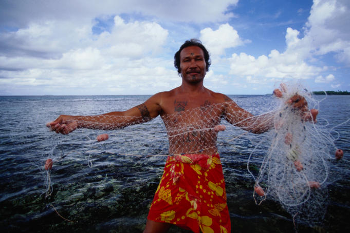 Samoan fisherman with net at Funafuti Atoll.