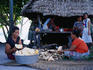 Nui Atoll, May 2000. Fenua Tapu islet. Aloloima Sipane peels taro for feasting in the falekaupule.