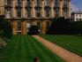 Students relaxing on lawns in front of Clare College (1326).