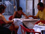 Ordering a meal at a restaurant in the Plaza de la Virgen.