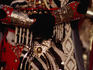 Detail of a Moorish costume in the Fiesta de Moros y Cristianos, celebrating the Christian reconquest of the town from the Arabs, passes the Basilica de Santa Maria.