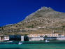 View from port of Mt Santa Caterina 314m, and the abandoned tuna processing plant Tonnaro Florio in Favignana.