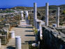 Headless statues remain standing in the ruins of the House of Cleopatra.