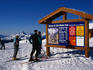 An information board offers skiers a guide to the slopes around Little Whistler Peak.