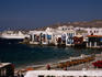 An outdoor cafe and balconied buildings on the 