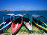 Colourful boats on the shores of Lake Peten.