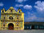 The bizarre, highly decorated bright yellow church of San Andres Xecul in Totonicapan.