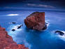 Puu Pehe (Sweetheart Rock) at dusk from atop the Pali Lei no Haunui (cliffs) at Manele Bay, Lanai.