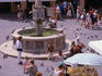 The Plateia Ippokratus square in the Old Town has a medieval fountain flanked by restaurants and shops, Rhodes.