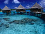 Stilt bungalows over the waters of Rangiroa Lagoon.