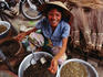 A Hoi An market vendor and her stall.