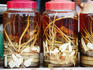 Snake wine for sale, a local delicay of the Mekong River delta area.