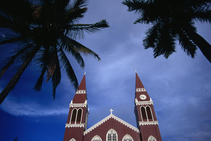 The historic landmark red church of Grecia.