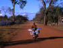 An ice vendor travels the roads of Siem Reap looking for an ice-box or a drink needing a cool down.