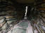 Covered section of central passageway linking houses in a Neolithic village