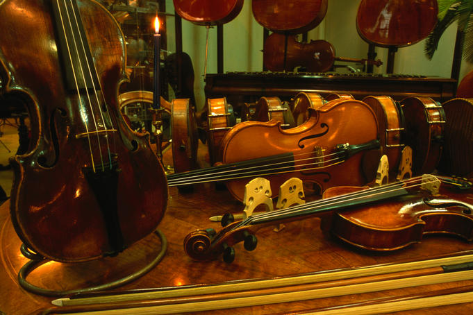 Violins displayed at Hudebni Nastroje U Zlateho Kohouta in Old Town Prague.