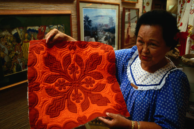 Aunty Malia with handicrafts from her museum/shop in Waikiki.