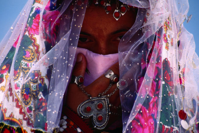 Bride with traditional headwear.