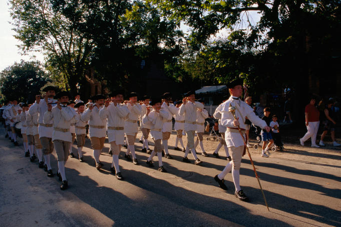 Drum and fife band marching.