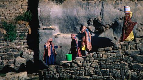 Women collecting water.
